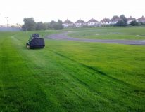 Eastwood School, South End on Sea Essex. First cut of new grass surrounds and infield area on a new build Mondo Ahtletics track. Picture taken only 6 weeks form completion of cultivation & seeding.