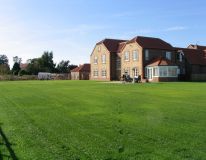 A new build home and its new lawn area at Appleby near Scunthorpe. Picture taken following first cut only 5 weeks from completion of stone burying & seeding.